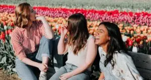 The image shows three people, feeling relieved after finding out about smart goals for trauma treatment.