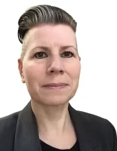 The image shows Natalie, providing trauma counselling in Calgary