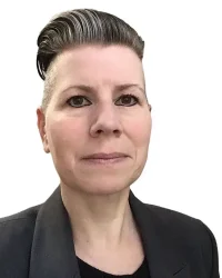 The image shows Natalie, providing trauma counselling in Calgary